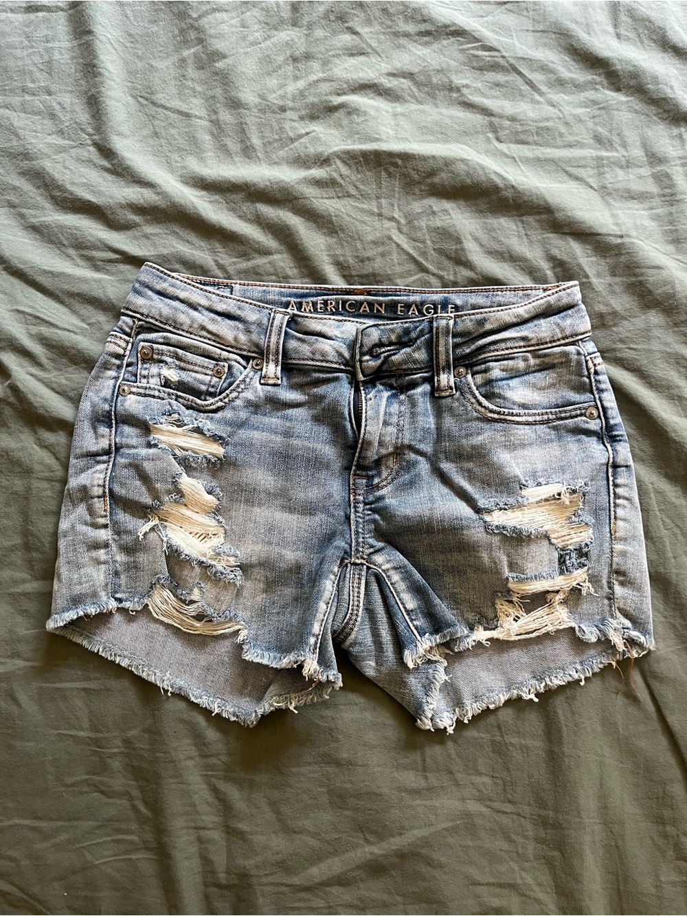 American Eagle Outfitters Light Wash Distressed Denim Cutoff Shorts lace pockets